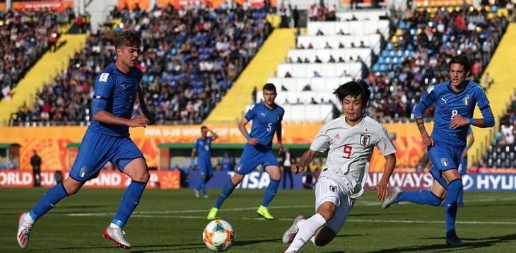 World Cup: Italy draw with Japan to win their group